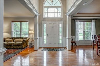 Entryway with hardwood / wood-style floors, health