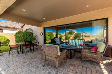 Glass Wall and Outside Dining/Lounging
