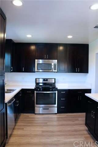 New Stainless Steel Stove and Microwave