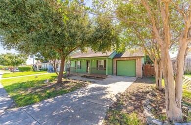 Ranch-style house with a porch, brick siding, and