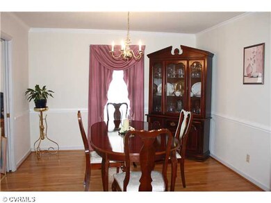 Dining Room - Gorgeous Hardwood Flooring and Chair