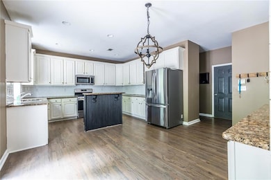 Large kitchen with granite counters, tons of stora