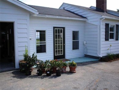 Exterior Front. Breezeway/Sunroom