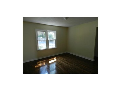 BEDROOM WITH HARDWOODS