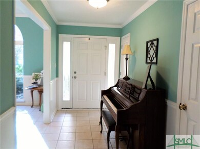 Foyer entrance with tile floor.