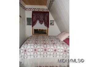 Queen size bed. Main level