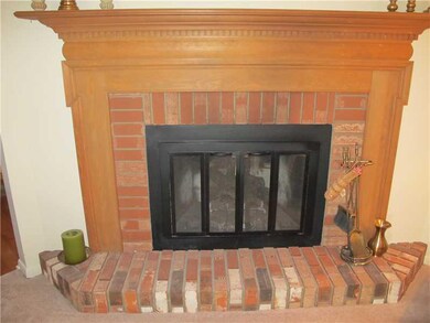 Other. Brick fireplace in the living room
