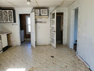 Main floor Laundry to the left and front porch