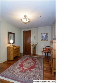 Wide, welcoming foyer with a gracious coat closet.