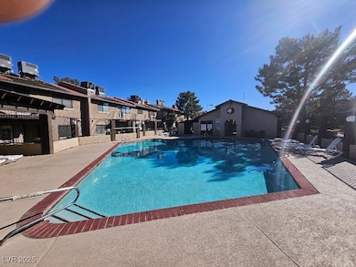 Pool with a patio and central air condition unit