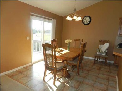 Spacious Dining Area! Patio Door leads to the Deck