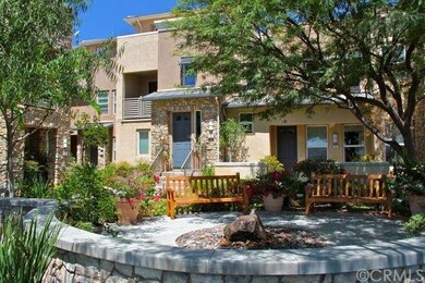 Pristine townhome with a gorgeous front yard and s