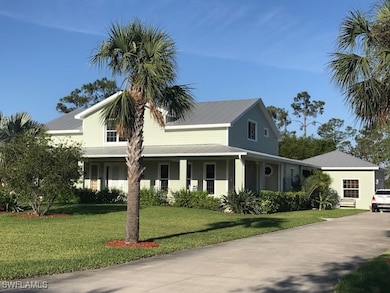 Farmhouse with a front yard