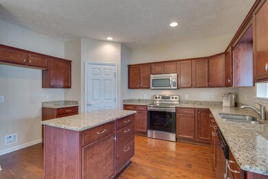 Great kitchen.  Hardwood floors, granite counter tops, pantry and stainless steel appliances.  Stove is new.