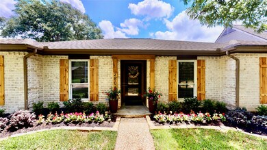 Custom Cedar entry, with cedar shutters bring a we