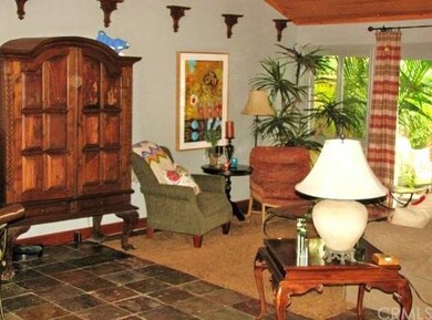 View of the living room with the patio on the righ
