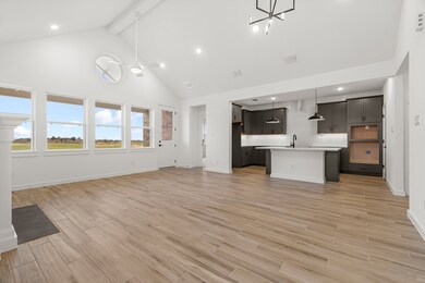 Open dining area and great room (*Photo not of act