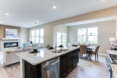 The open concept living-kitchen-dining setup! *Model photo, selections and colors may vary!