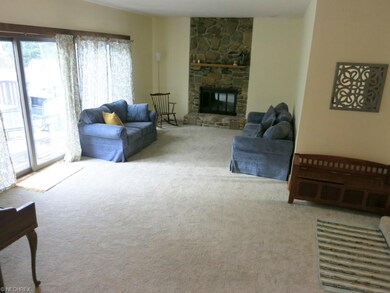 Very large family room with stone gas fireplace.  