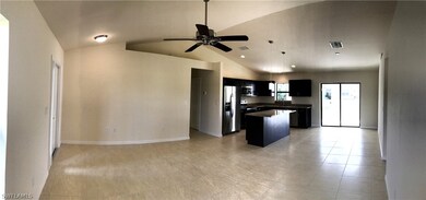 GREAT ROOM, KITCHEN AND DINING AREA WITH SLIDING G