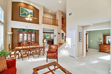 Open Living room and dining room with vaulted ceil