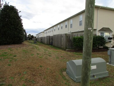Behind the building