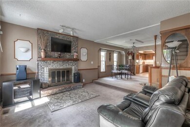 Enjoy the fireplace in this nice open floor plan..