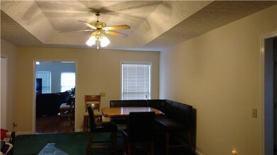 Living room with Trey Ceiling.... being used now as Dining area