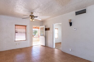 Living room w/ view of BR & front