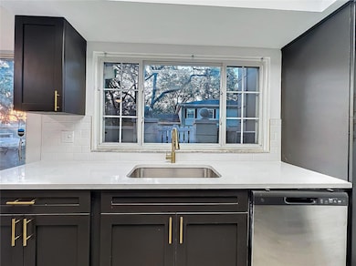 Upgraded Kitchen,  Black Cabinets, Quartz Countertops, soft close cabinets / Drawers