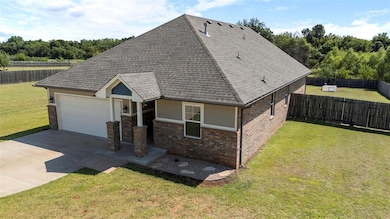 View of front of home featuring brick siding, an attached garage, roof with shingles, and concrete driveway