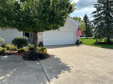 Garage with garage and a yard