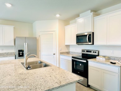 1256 Dugan Cir SE, Palm Bay, FL 32909 - photo 6