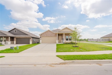 View of front of property featuring brick siding,