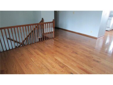 Brand new wood flooring in living room and hallway