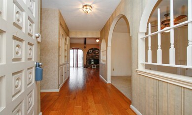 View from front door!  Large entryway, wood floori