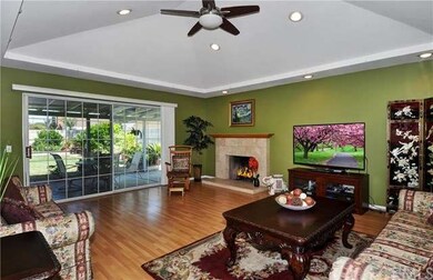 Living Room has Cathedral Ceiling with 16 Recessed