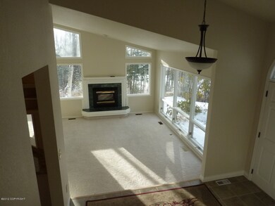 View of living room from top of stairs