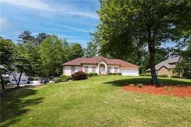 View of front of house with an attached garage and