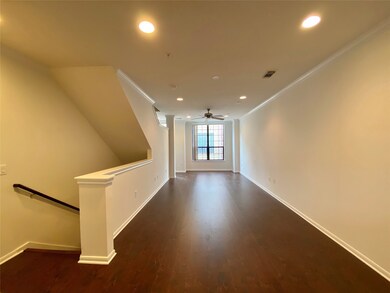 View of Living and Dining area with stairs to the
