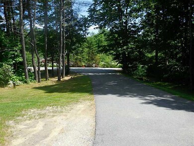 Exterior Front. Entrance from road.