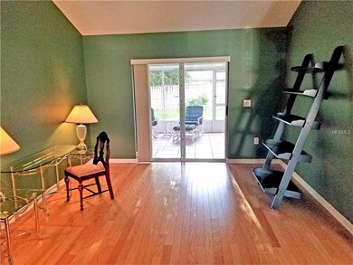 Formal Living room with vaulted ceilings, hardwood