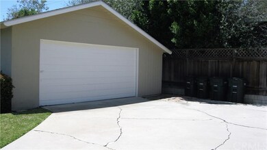 Detached Garage with Extra Parking Space!