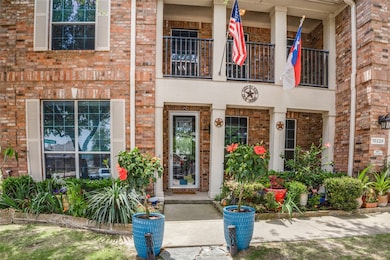 Doorway to property with brick siding
