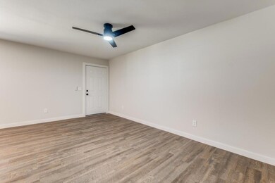 Spare room featuring light wood-type flooring and 