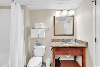 Full bathroom with vanity and toilet
