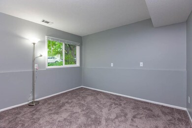 First bedroom in 11654. New carpet and trendy pain