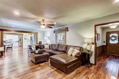 View of the entry, living and easy flow to the dining and kitchen.