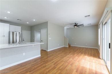Unfurnished living room featuring recessed lightin