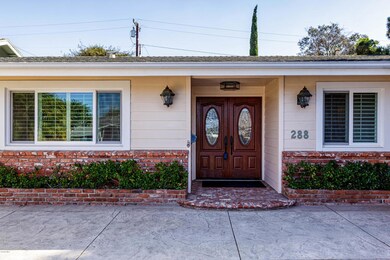 002_02_front_of_home